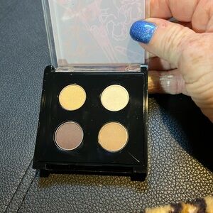 Beautiful Lancome eyeshadow kit. Four different colors. Never been used.